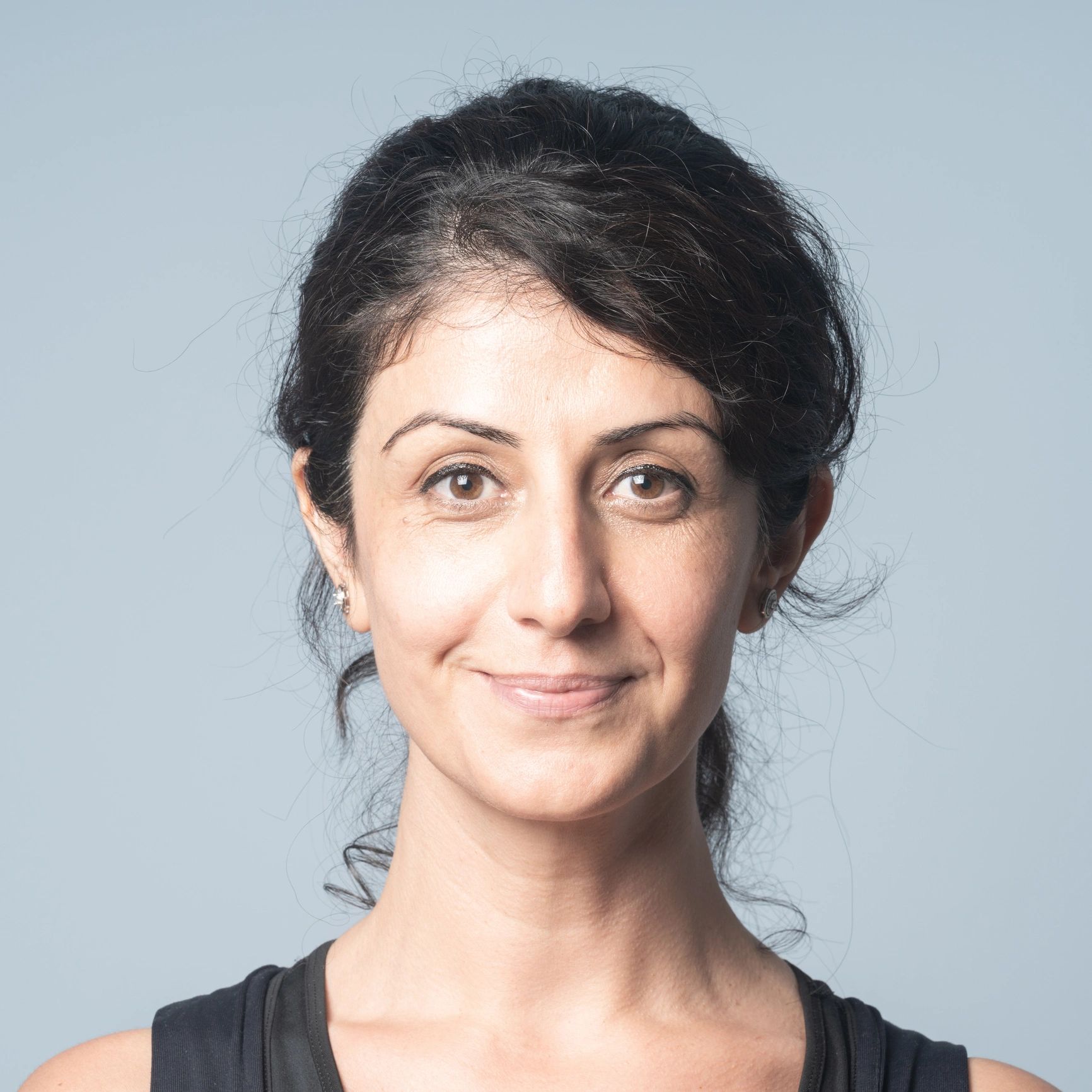 Professional headshot of a woman smiling