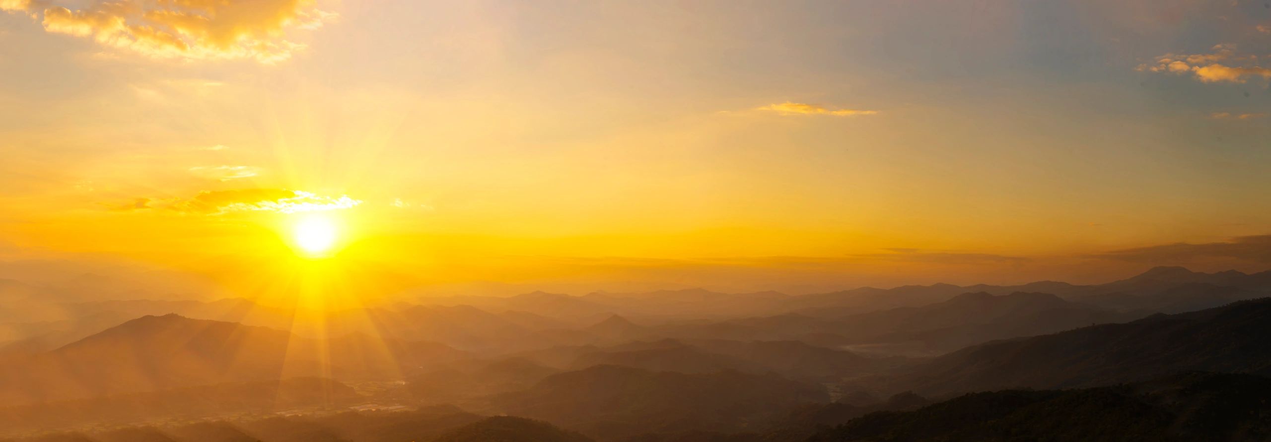 Panoramic sunrise landscape symbolizing resilience and renewal